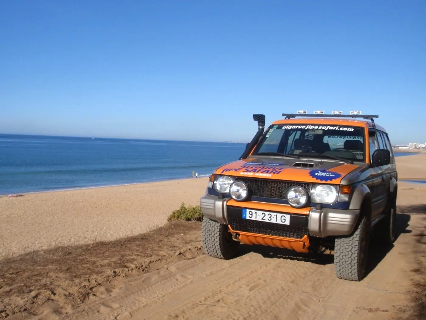 Algarve Jipe Safari jeep above a sandy beach