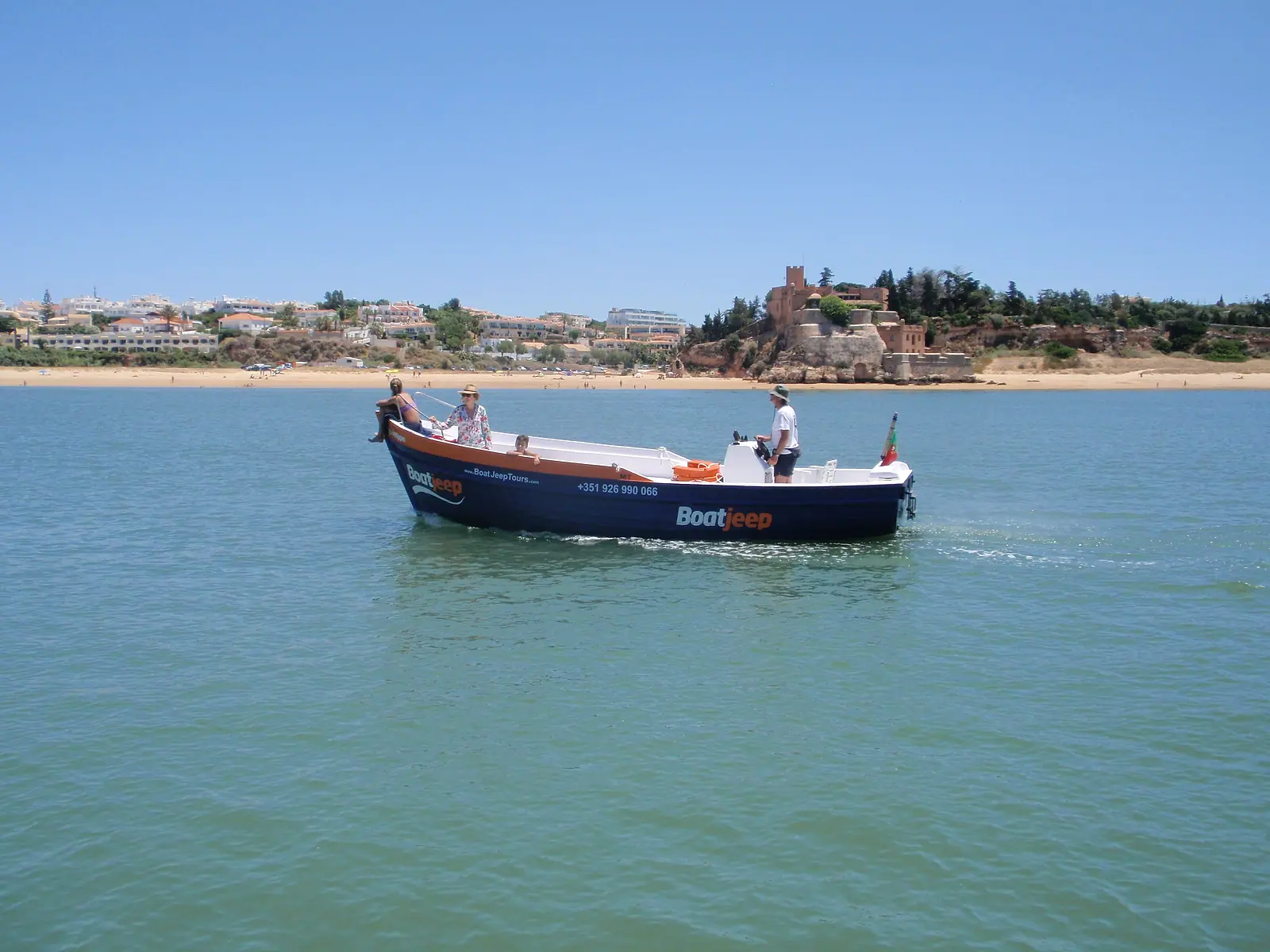 Small traditional boat on the River Arade