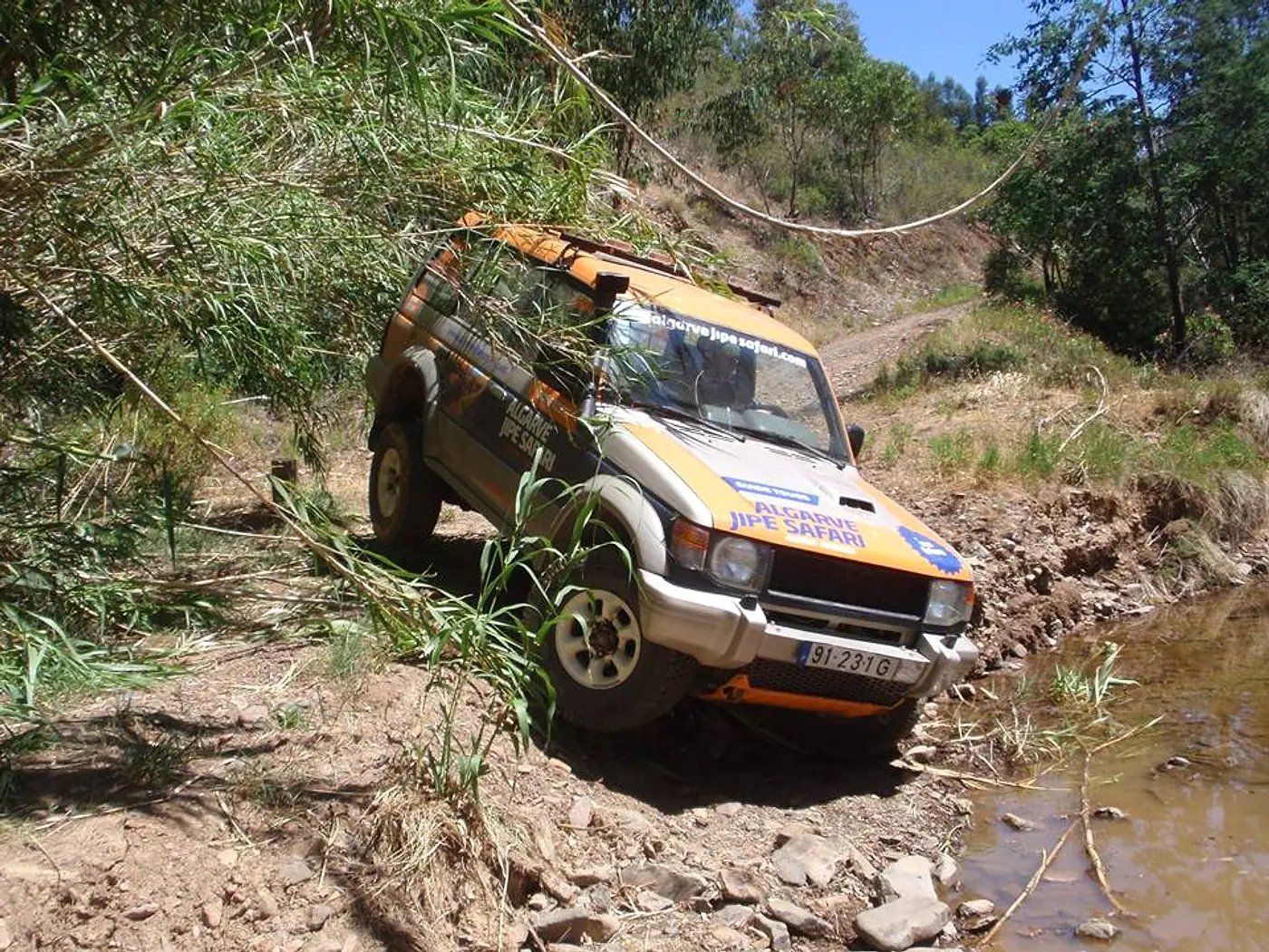 Algarve Jipe Safari jeep descending a rocky trail